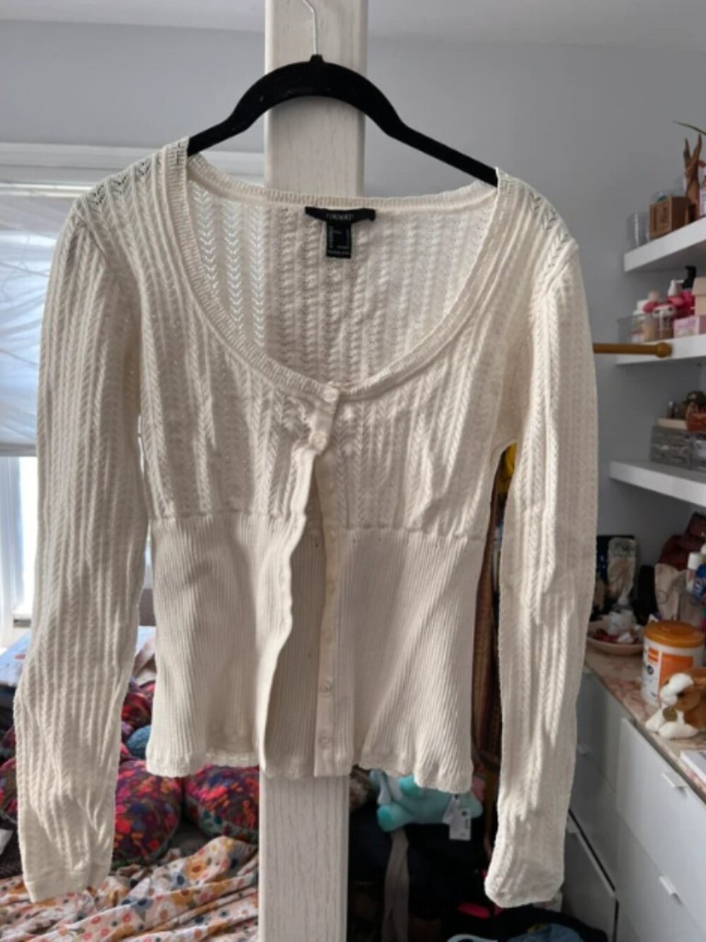 Women’s white long sleeve button up babydoll cardigan